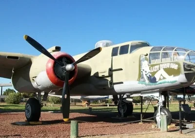 Vintage military aircraft displayed in outdoor museum.