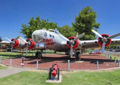 Vintage airplane displayed in outdoor museum setting.